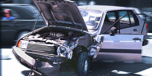 Accident-damaged car with a crumpled front end
